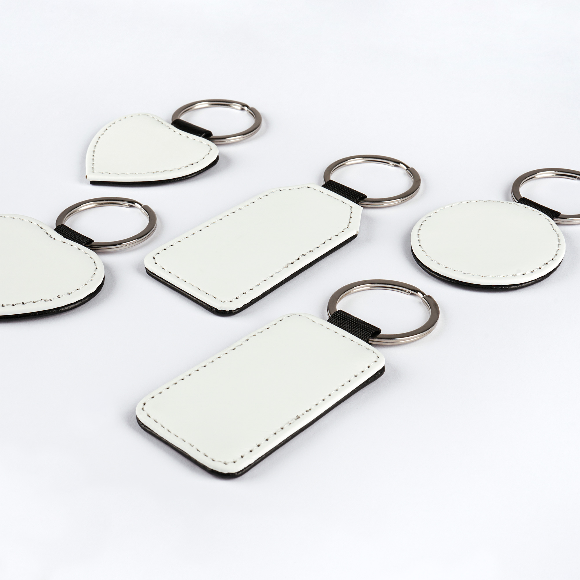 Subli Leather, Schlüsselanhänger aus Kunstleder, verschiedene Größen Subli Leather, Schlüsselanhänger aus Kunstleder, verschiedene Größen